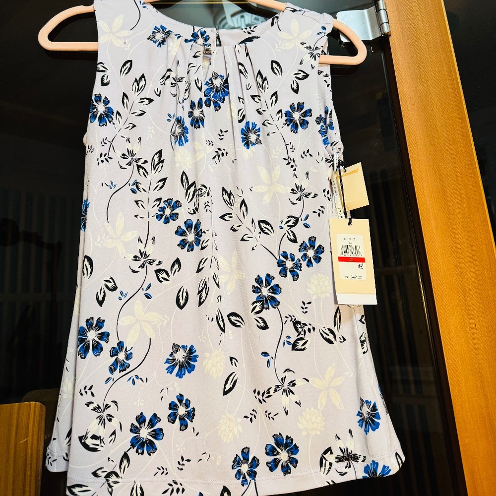 Lavender floral sleeveless poly/spandex work or casual